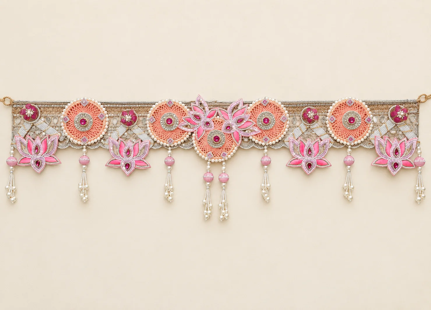 Pink lotus and pearl bandhanwar on an ivory background